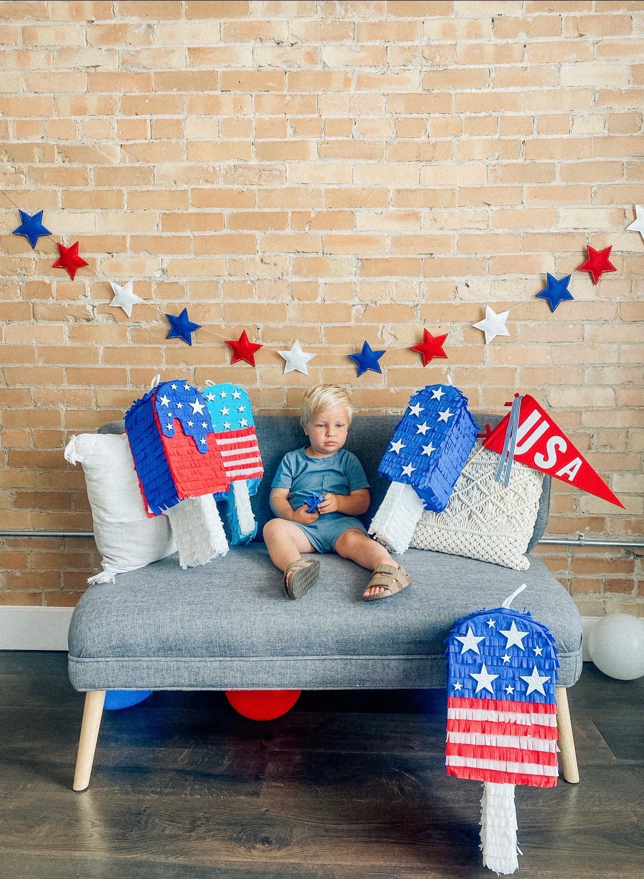 July Popsicle piñata (red,white,blue strips)