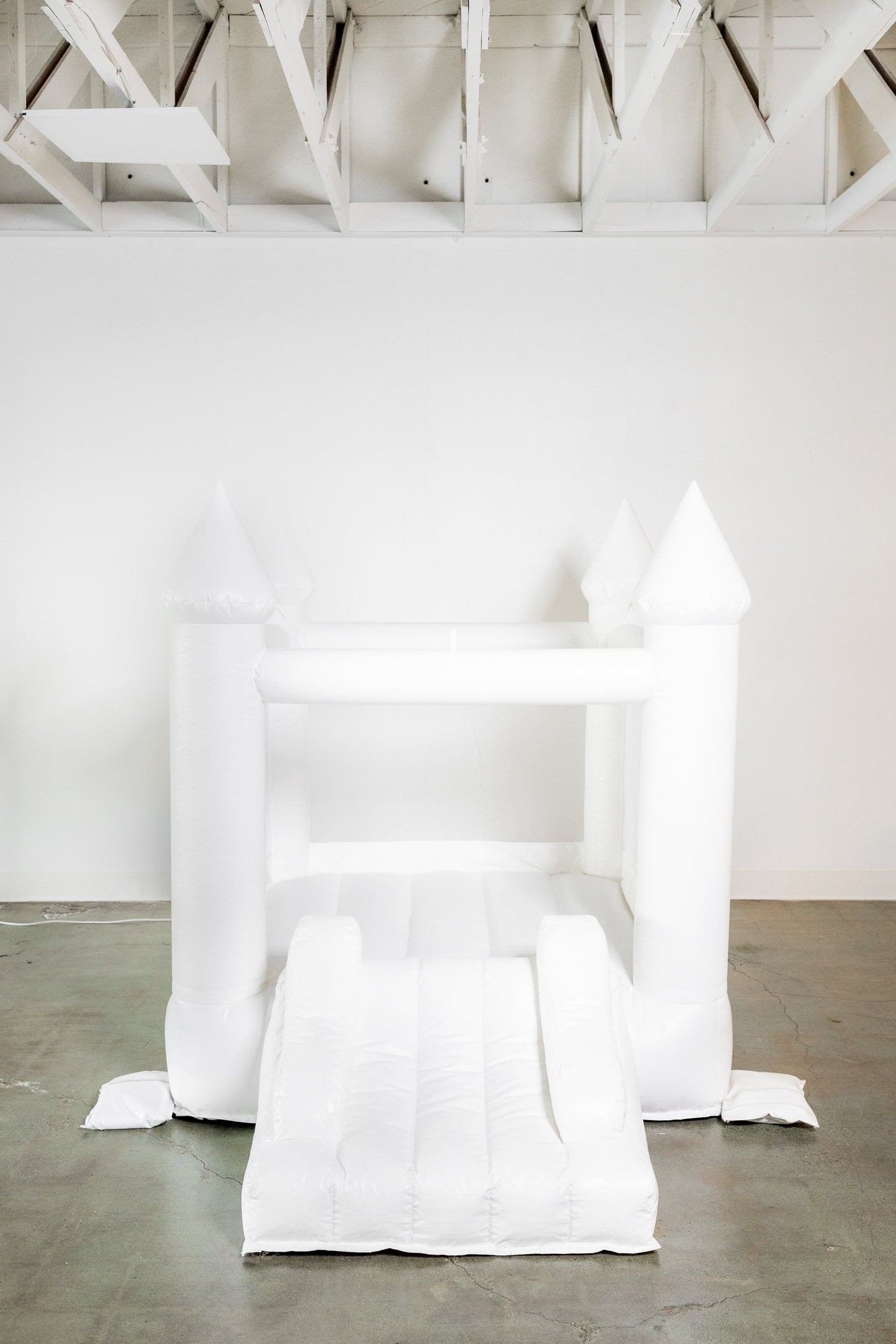 Mini Ava - White Bounce House with Cone Tops